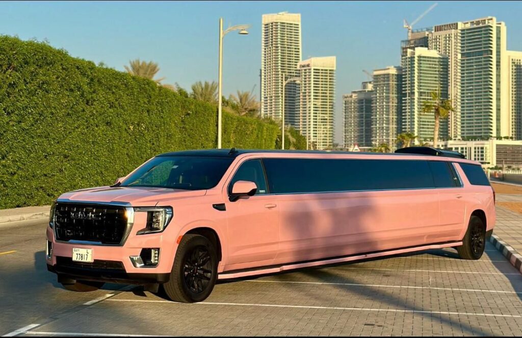 Pink limousine transfer from Abu Dhabi to Dubai for stylish travel