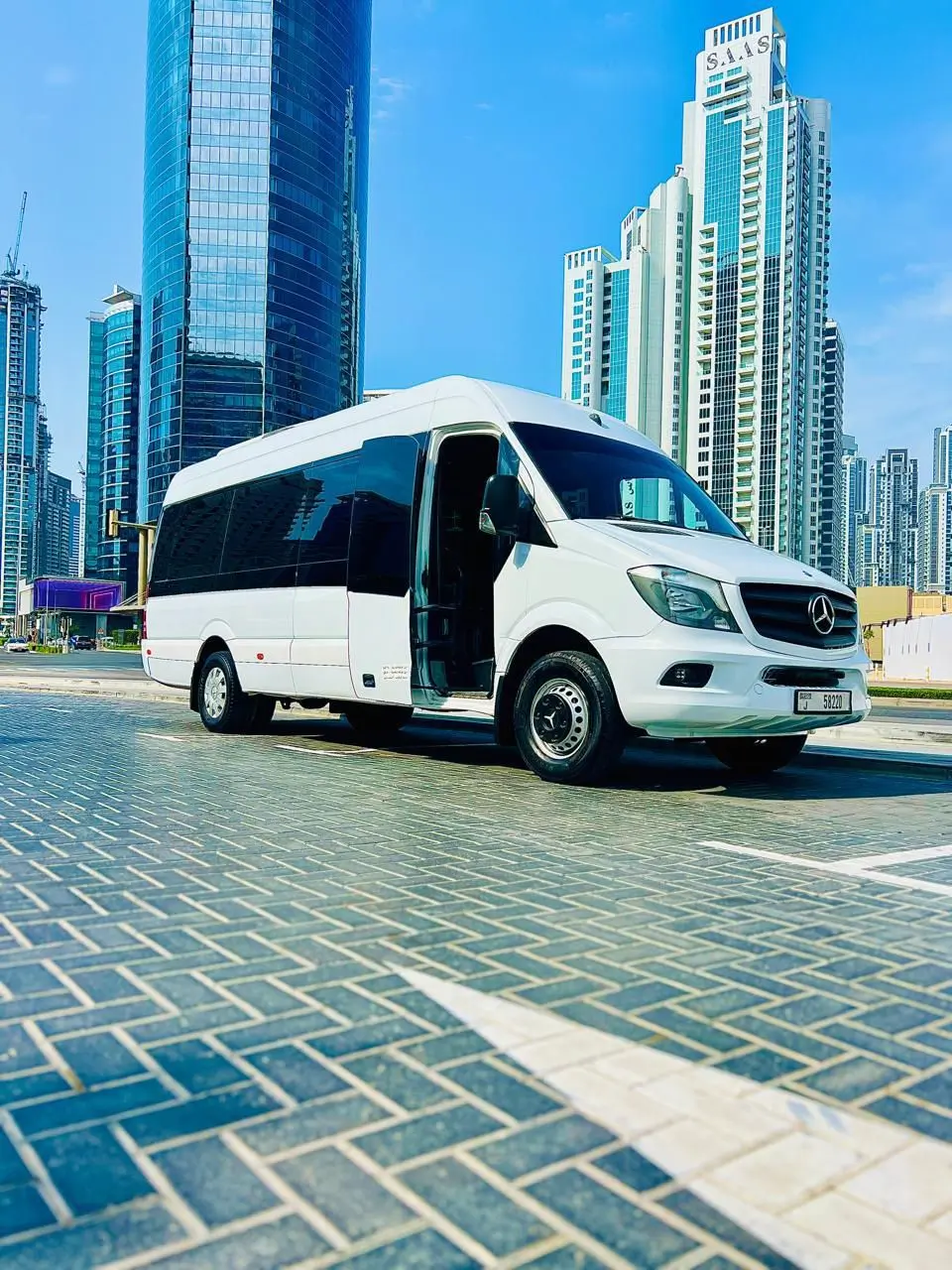 Mercedes-Benz Sprinter white 16-seater passenger van in Dubai
